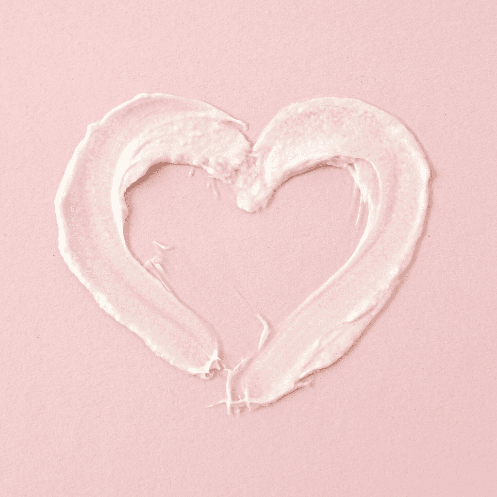 Skincare cream texture swatch in the shape of a heart