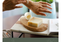 Person applying herbal calendula balm after spending time outdoors with handmade soap, illustrating natural bug bite relief and botanical summer skincare.